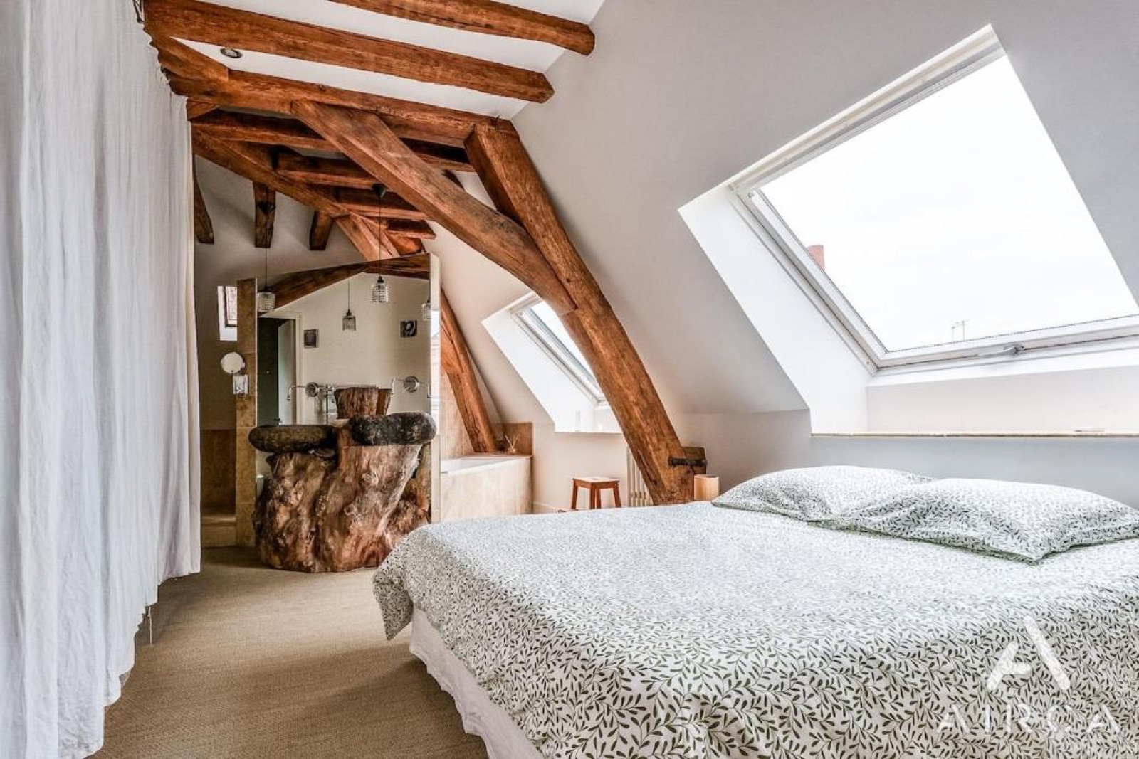 Chambre principale sous charpente